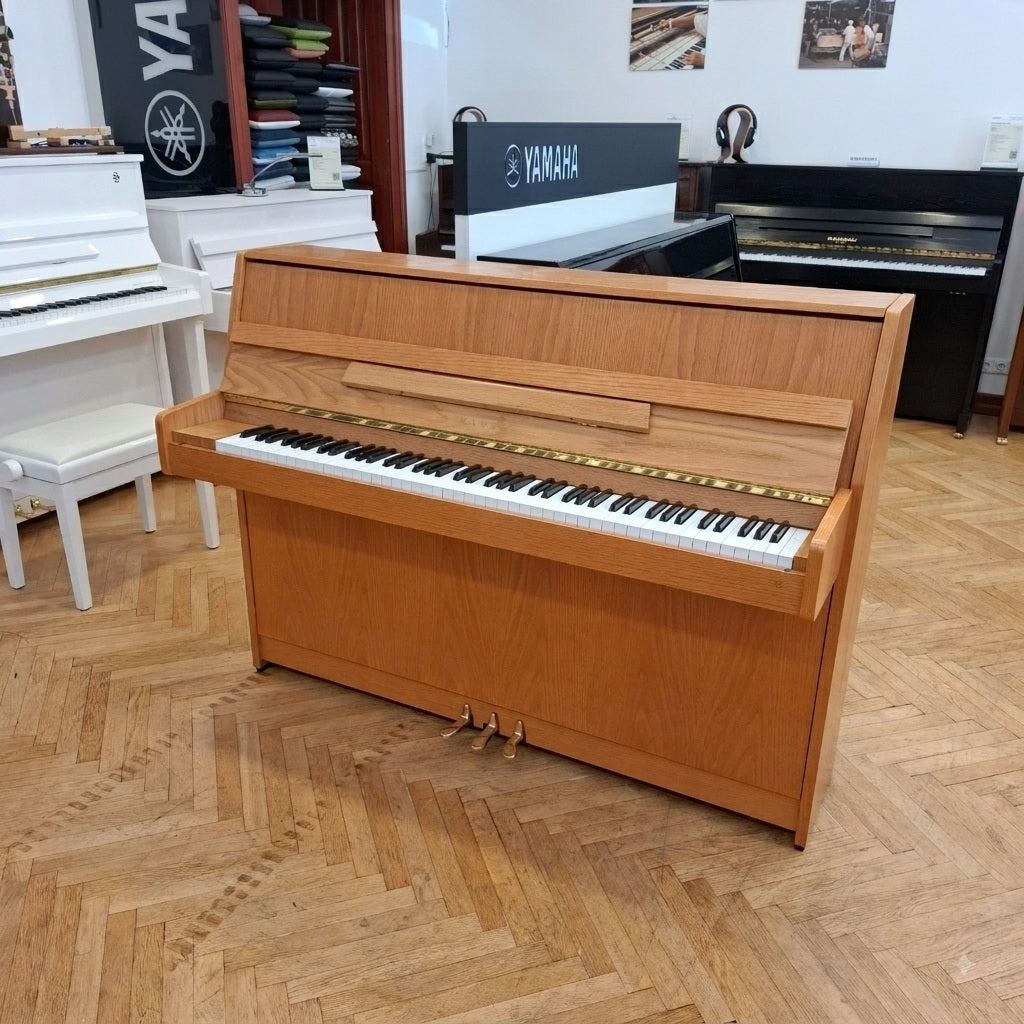 Piano Kawai CX-8 in eiche hell satiniert von vorne mit 3 Pedale 