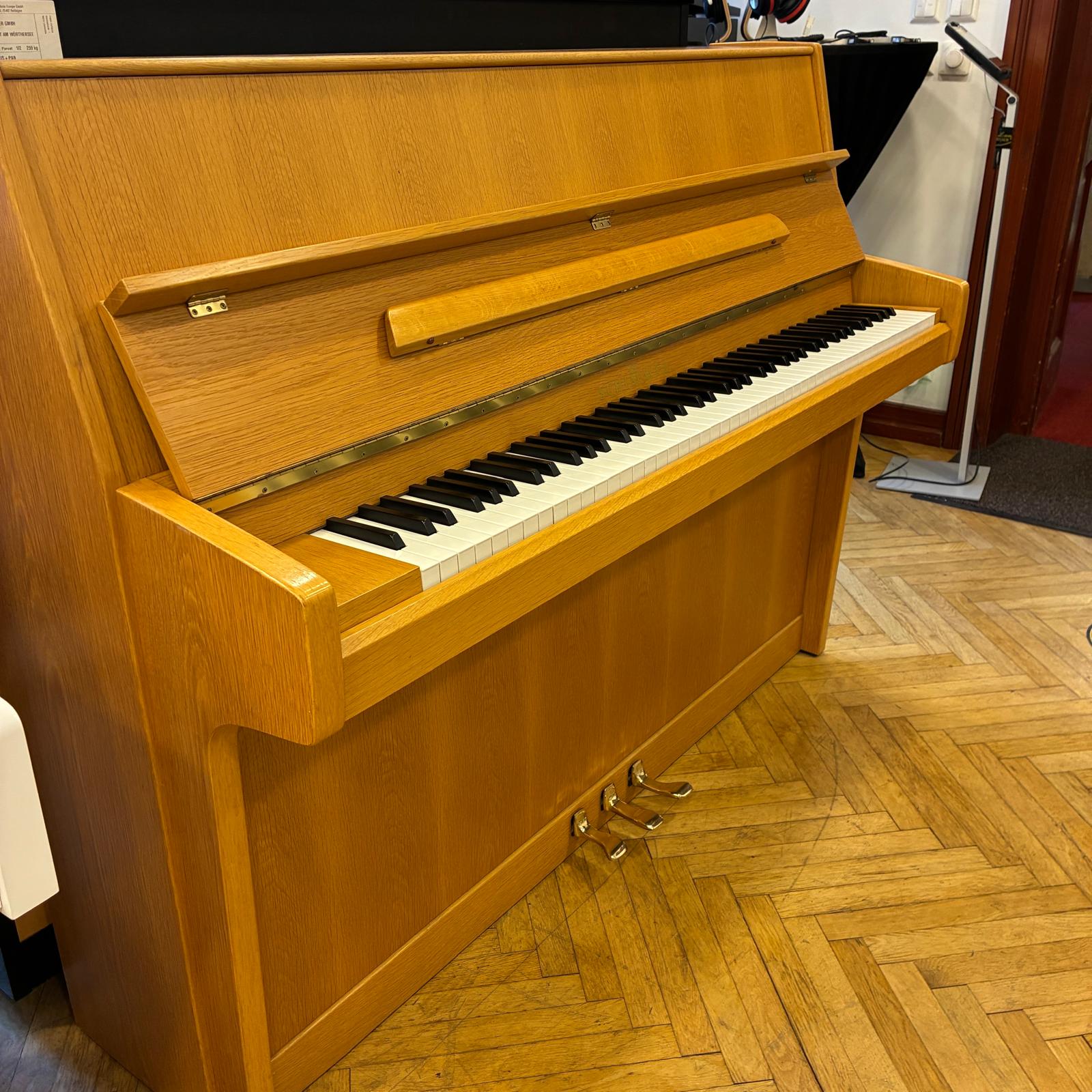 Piano Schimmel 112 cm hoch ohne Rollen Eiche hell Funier 3 Pedale
